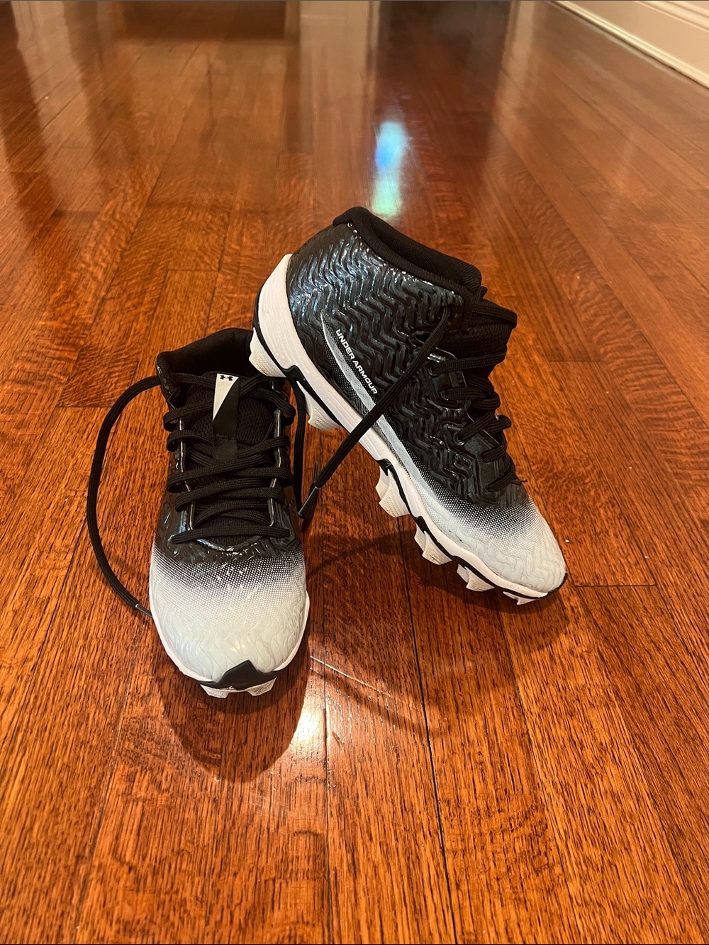 Under Armour Black and White Gradient Athletic Cleats